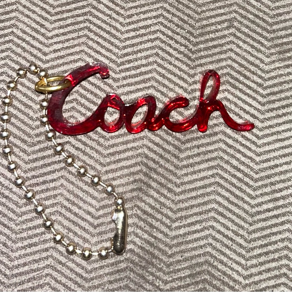 Coach Poppy Acrylic Script Tag with gold chain